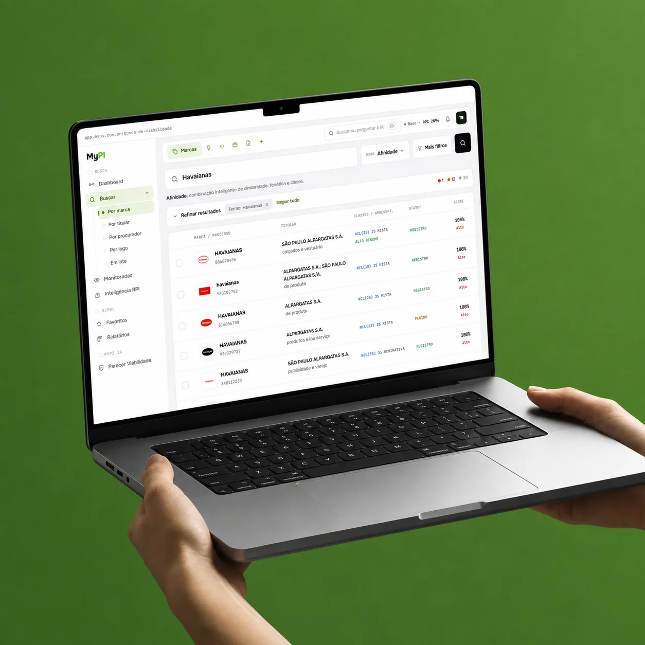 MyPI no notebook · resultados da busca de marcas com score e situação